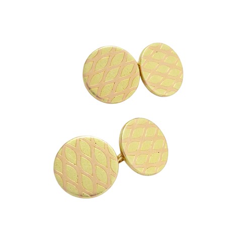 Pair of mid-20th century two-colour gold round panel cufflinks by Cartier, Paris c.1940,